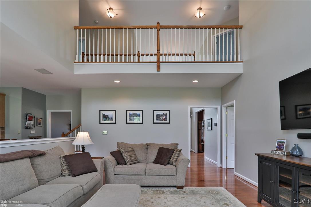 115 Kichline Road Hellertown, PA 18055 - Photo 11 of 45 a living room with furniture and a flat screen tv