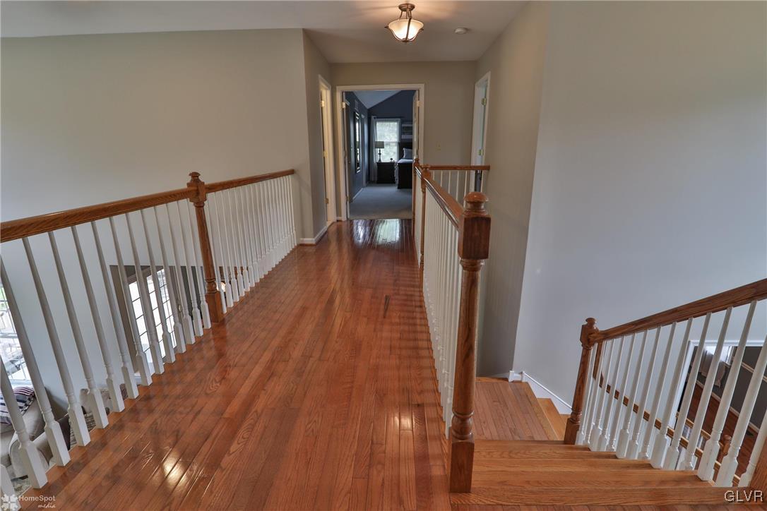 115 Kichline Road Hellertown, PA 18055 - Photo 15 of 45 a view of a hallway view with wooden floor and staircase