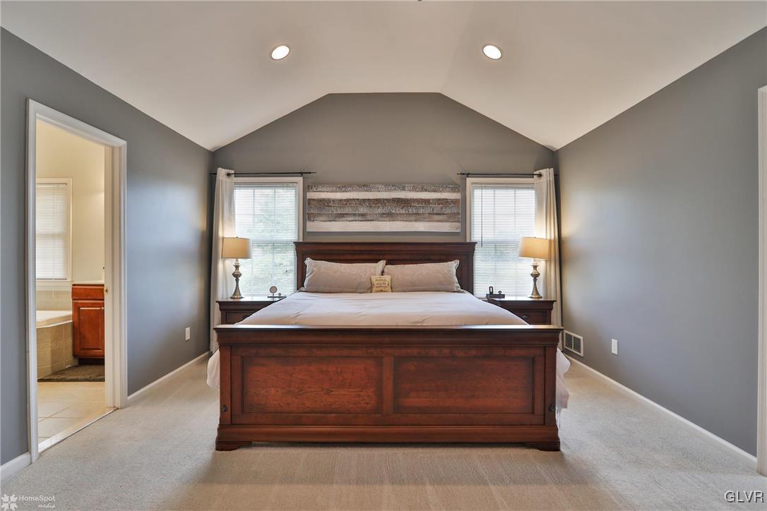 115 Kichline Road Hellertown, PA 18055 - Photo 17 of 45 a bedroom with a bed and a large window
