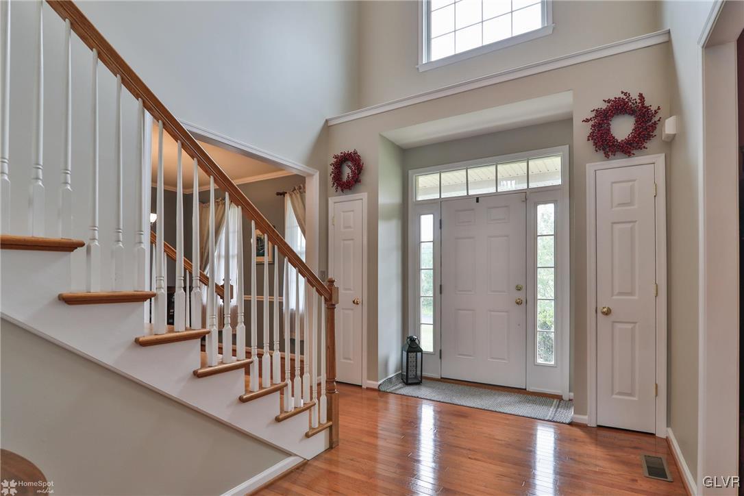 115 Kichline Road Hellertown, PA 18055 - Photo 3 of 45 a view of an entryway wooden floor and chandelier