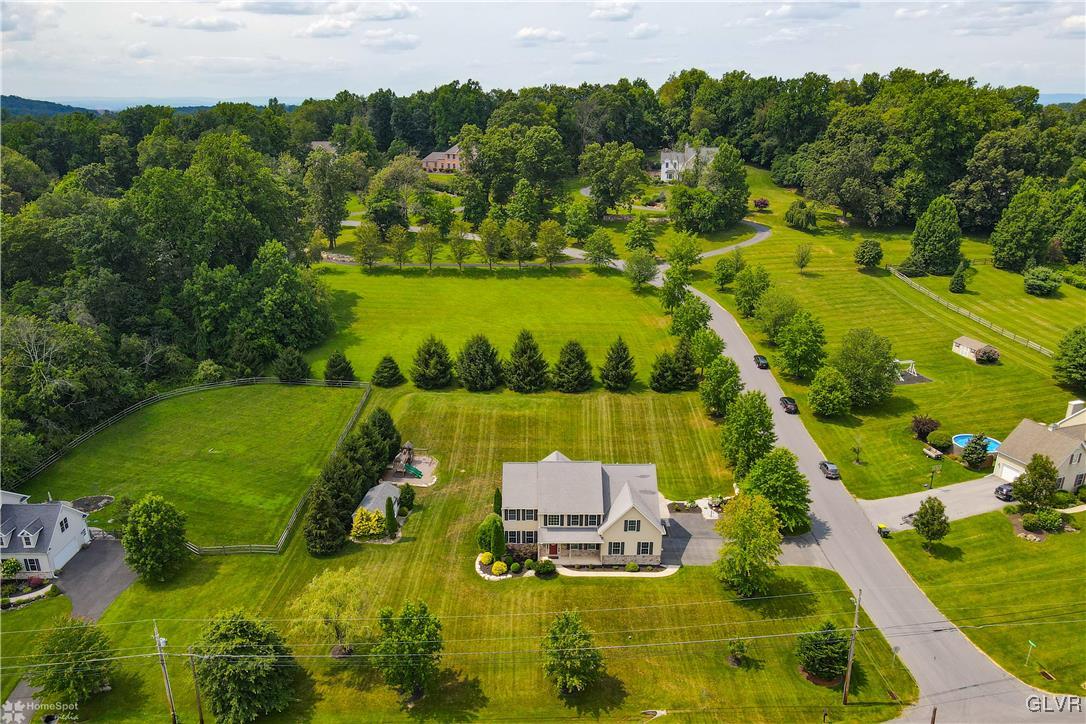 115 Kichline Road Hellertown, PA 18055 - Photo 45 of 45 an aerial view of lake residential houses with outdoor space and trees all around