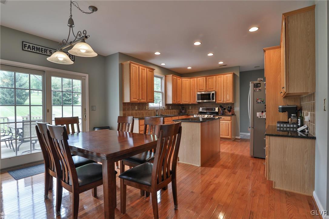 115 Kichline Road Hellertown, PA 18055 - Photo 8 of 45 a view of a dining room with furniture window and wooden floor