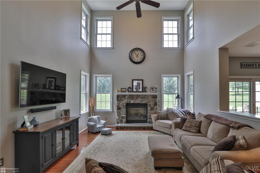 115 Kichline Road Hellertown, PA 18055 - Photo 10 of 45 a living room with furniture and a flat screen tv
