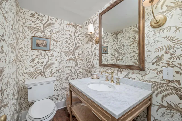 a bathroom with a sink and a toilet