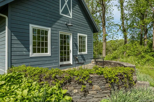 a backyard of a house with seating space
