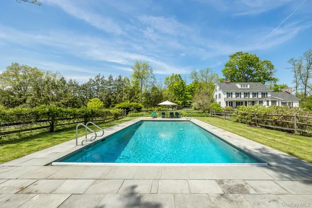 a view of swimming pool from a balcony