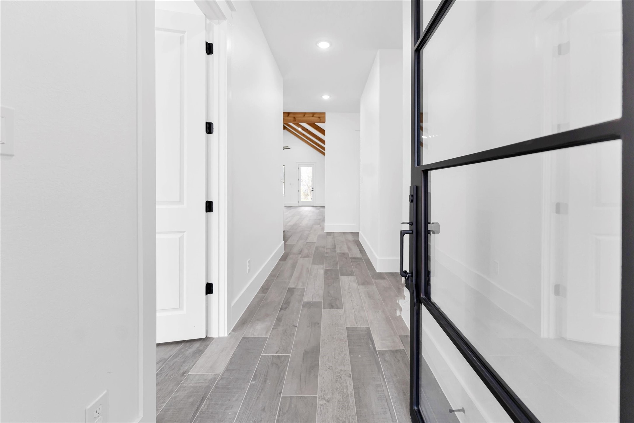 610 Sharon Street Prairie View, TX 77484 - Photo 11 of 42 a view of a hallway with wooden floor and staircase