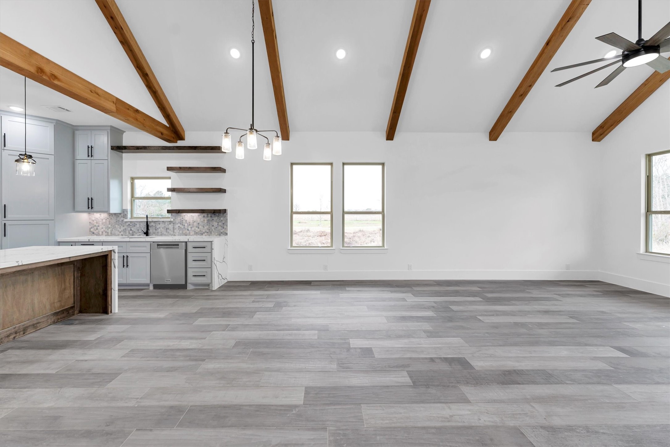 610 Sharon Street Prairie View, TX 77484 - Photo 16 of 42 a view of kitchen with stainless steel appliances kitchen island a large counter space and wooden floor