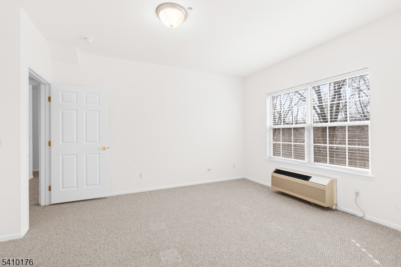 4 Richmond Road West Milford, NJ 07480 - Photo 11 of 25 an empty room with a window