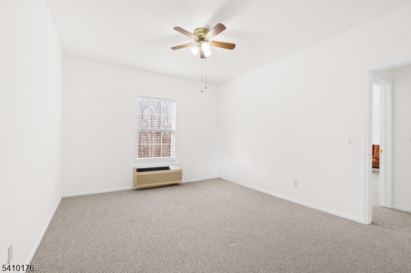 4 Richmond Road West Milford, NJ 07480 - Photo 13 of 25 an empty room with windows and fan