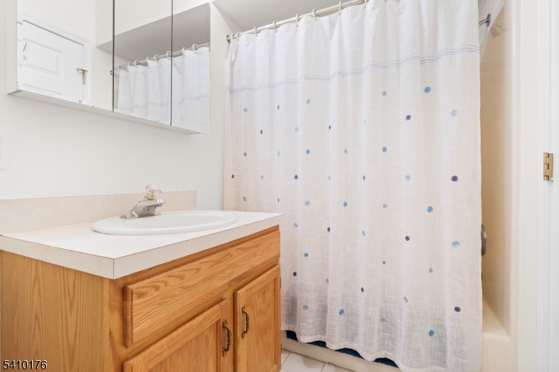 4 Richmond Road West Milford, NJ 07480 - Photo 18 of 25 a bathroom with a sink a vanity and a mirror