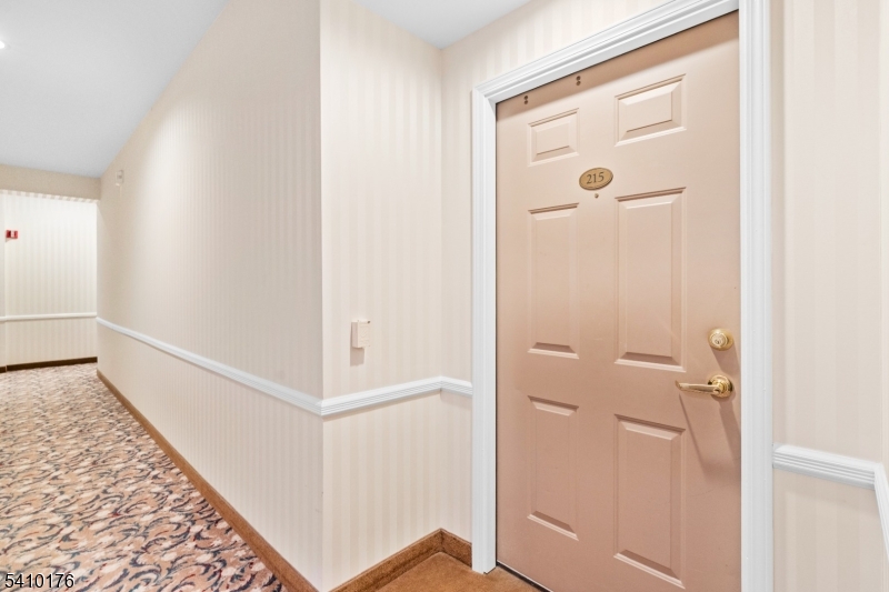 4 Richmond Road West Milford, NJ 07480 - Photo 4 of 25 a view of a hallway with closet and wooden floor
