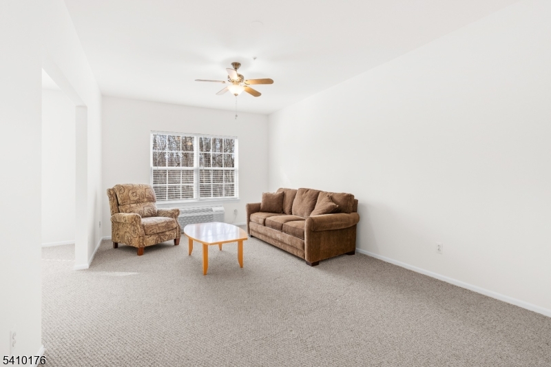 4 Richmond Road West Milford, NJ 07480 - Photo 8 of 25 a living room with furniture and a window