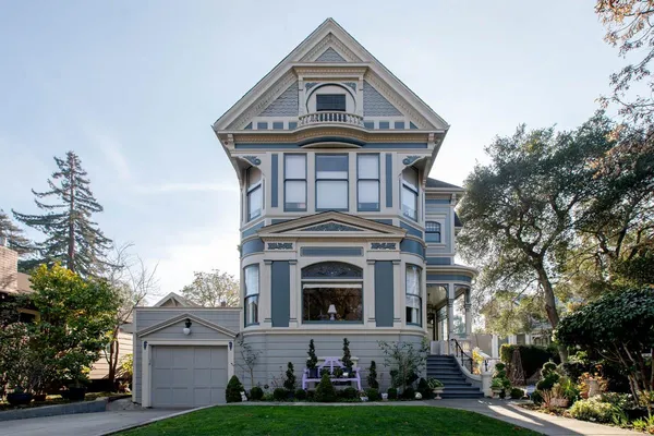 a front view of a house with garden