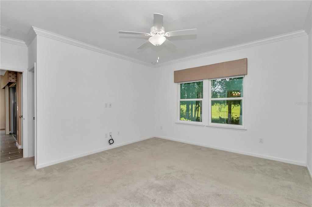 7867 Southwest 74th Loop Ocala, FL 34481 - Photo 24 of 55 an empty room with a window