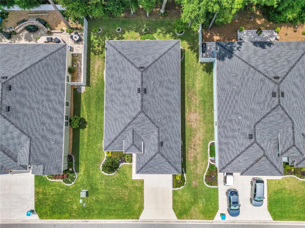 7867 Southwest 74th Loop Ocala, FL 34481 - Photo 42 of 55 aerial view of a house with a yard and large trees