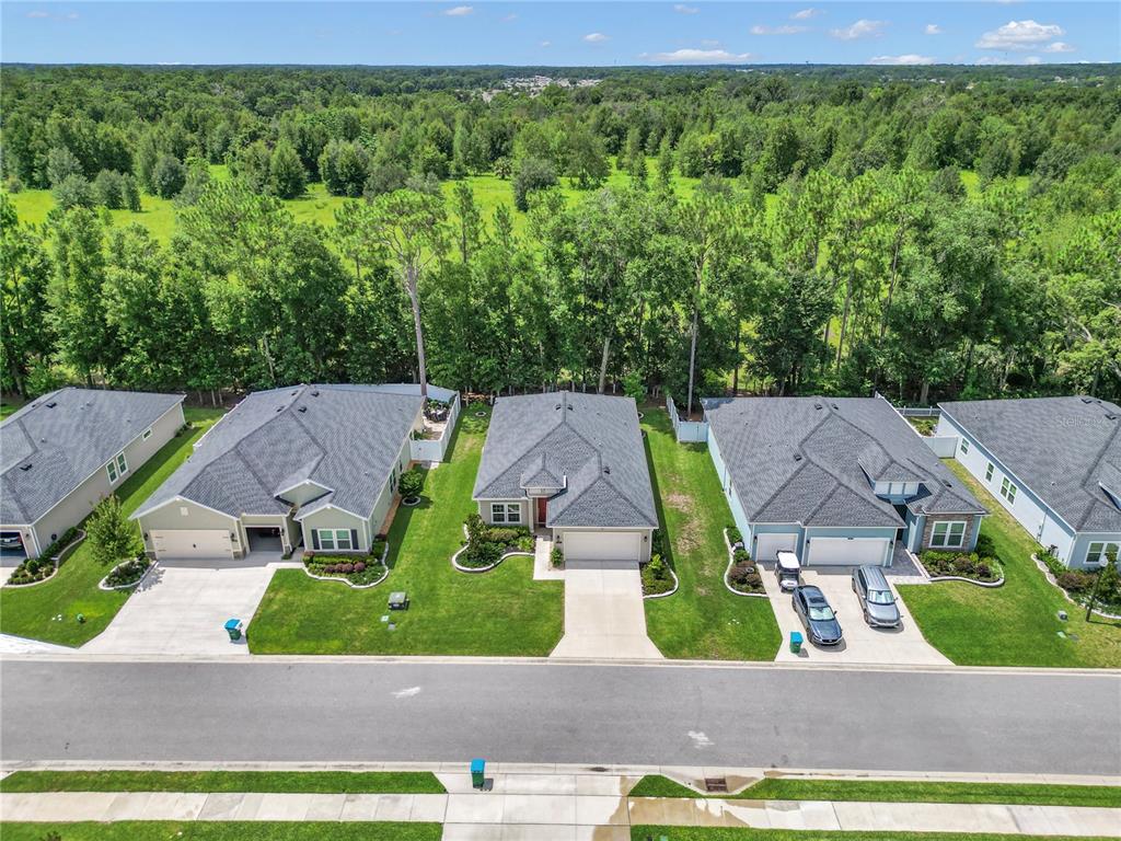 7867 Southwest 74th Loop Ocala, FL 34481 - Photo 43 of 55 an aerial view of multiple house
