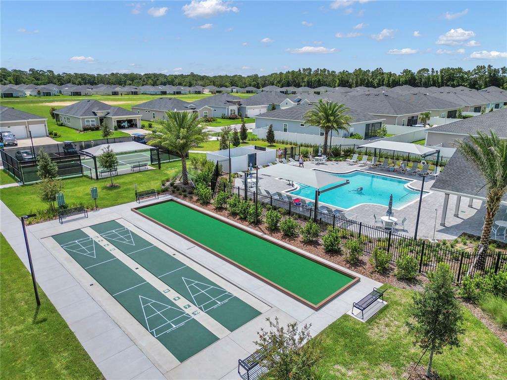 7867 Southwest 74th Loop Ocala, FL 34481 - Photo 44 of 55 an aerial view of a city with lawn chairs