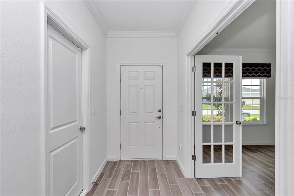 7867 Southwest 74th Loop Ocala, FL 34481 - Photo 8 of 55 a view of wooden floor in a room