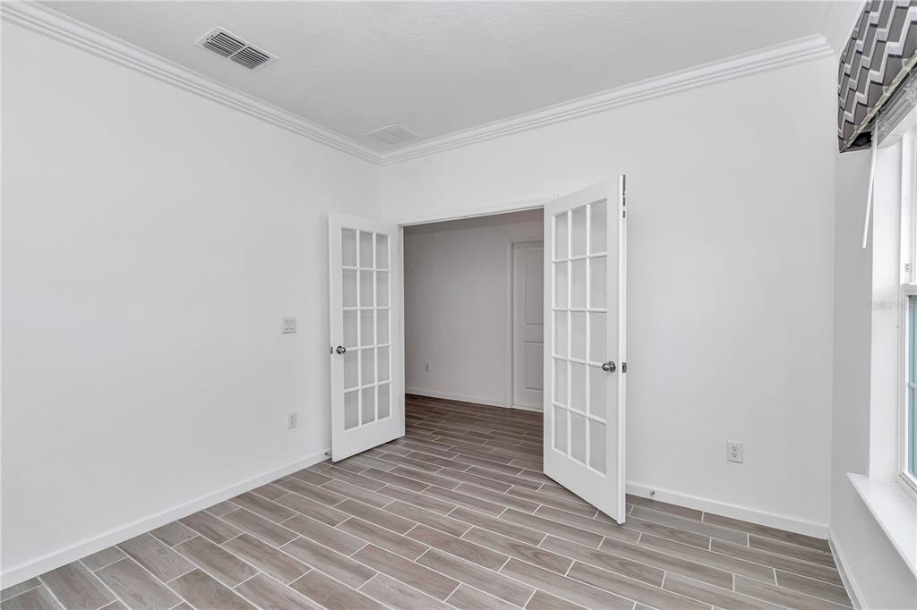 7867 Southwest 74th Loop Ocala, FL 34481 - Photo 10 of 55 a view of an empty room