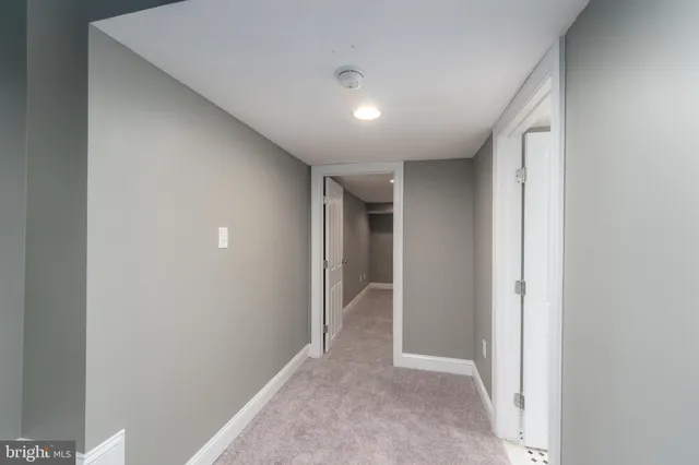 a view of hallway with closet