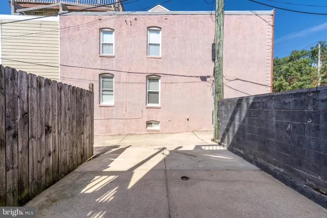 a bathroom with a sink and a shower