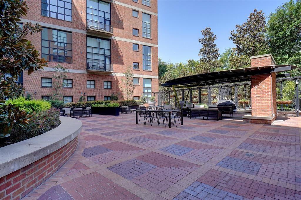 3110 Thomas Avenue, Unit 739 Dallas, TX 75204 - Photo 16 of 18 a building view with a outdoor space