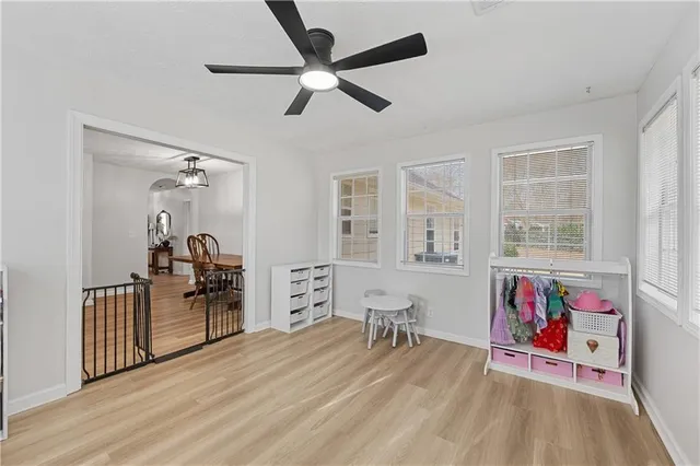 wooden floor with furniture and a window