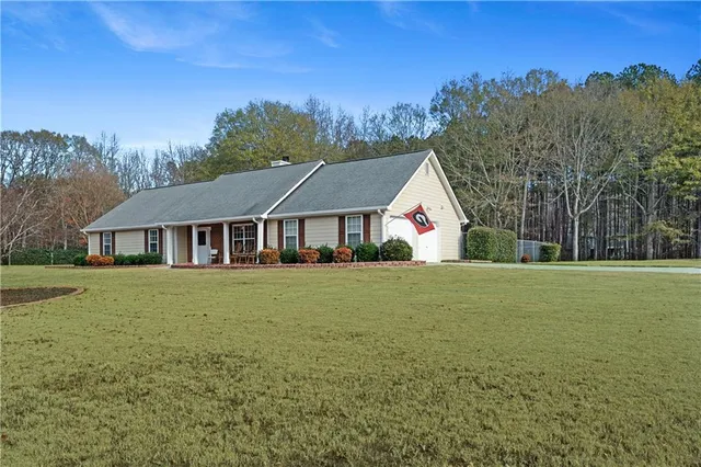 a view of house with outdoor space