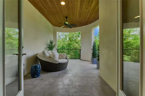 a bathroom with a double vanity sink mirror and window