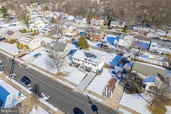 an aerial view of a city with lots of residential buildings