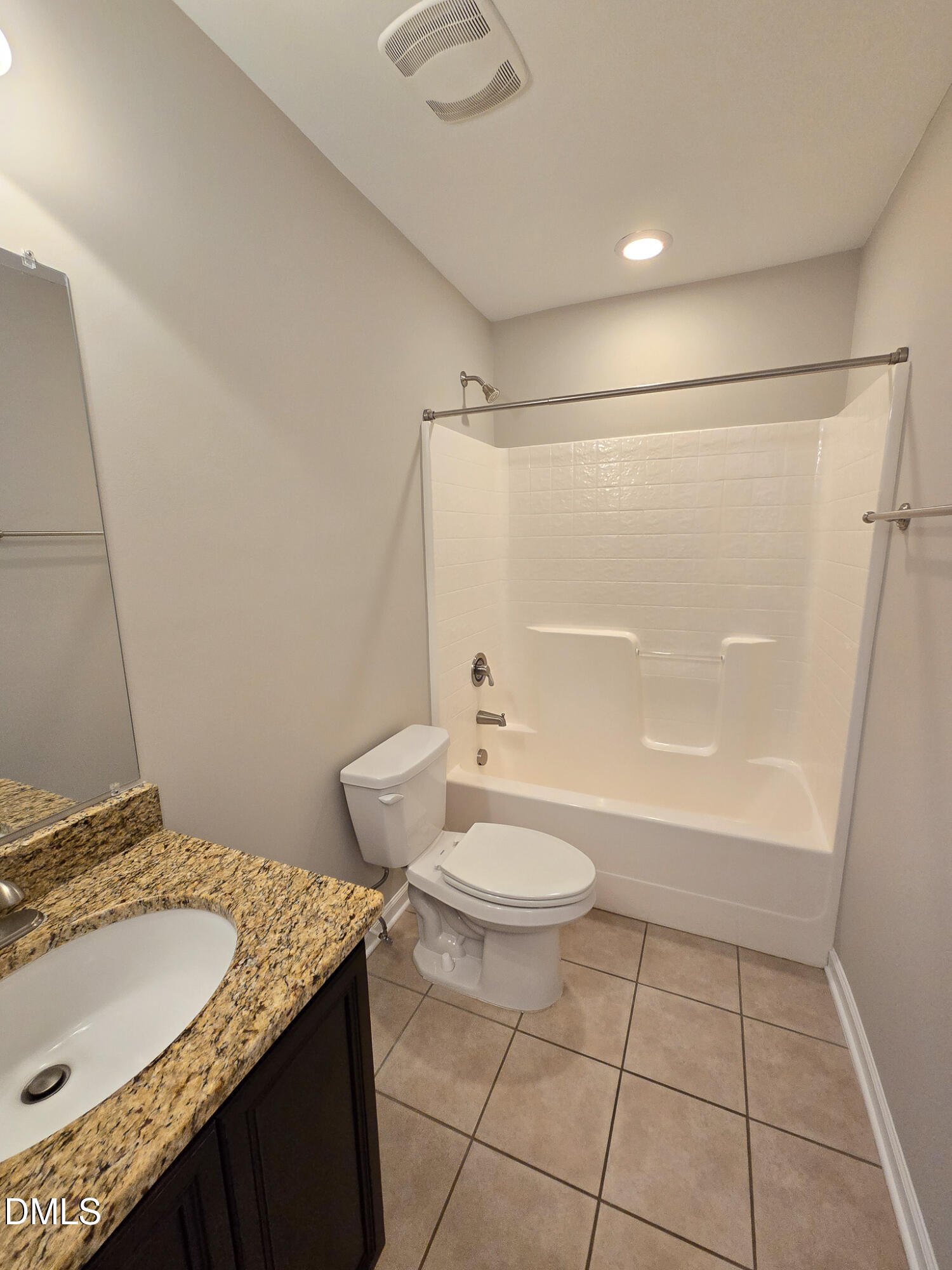 1133 South State Street Raleigh, NC 27601 - Photo 29 of 34 a bathroom with a granite countertop sink toilet and shower