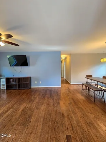 a view of a livingroom with furniture and wooden floor