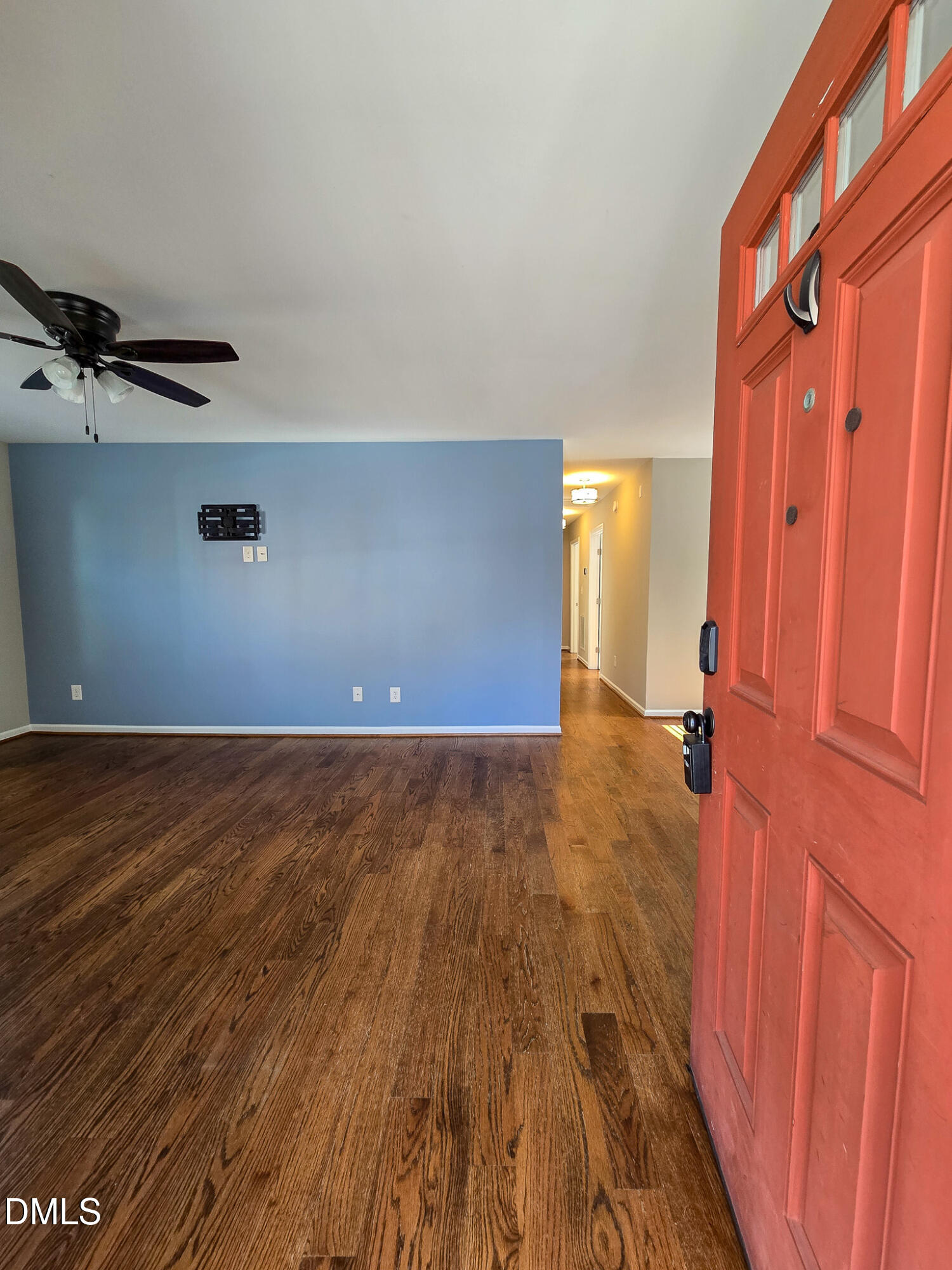 1133 South State Street Raleigh, NC 27601 - Photo 3 of 34 a view of a livingroom with wooden floor