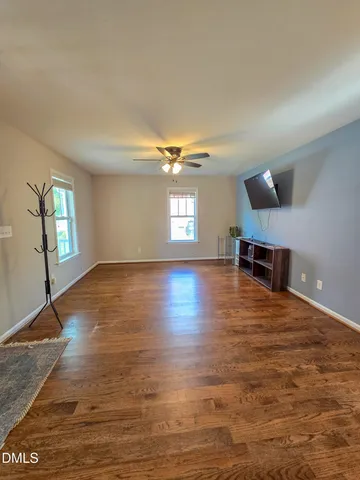 a view of livingroom with hardwood floor and window