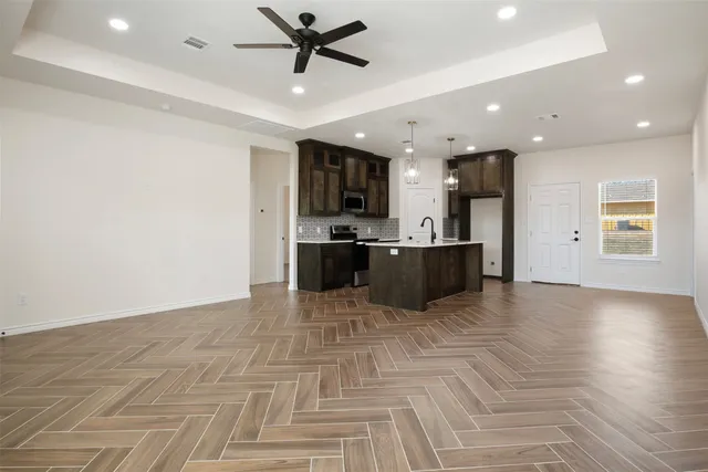 a front view of a house with yard