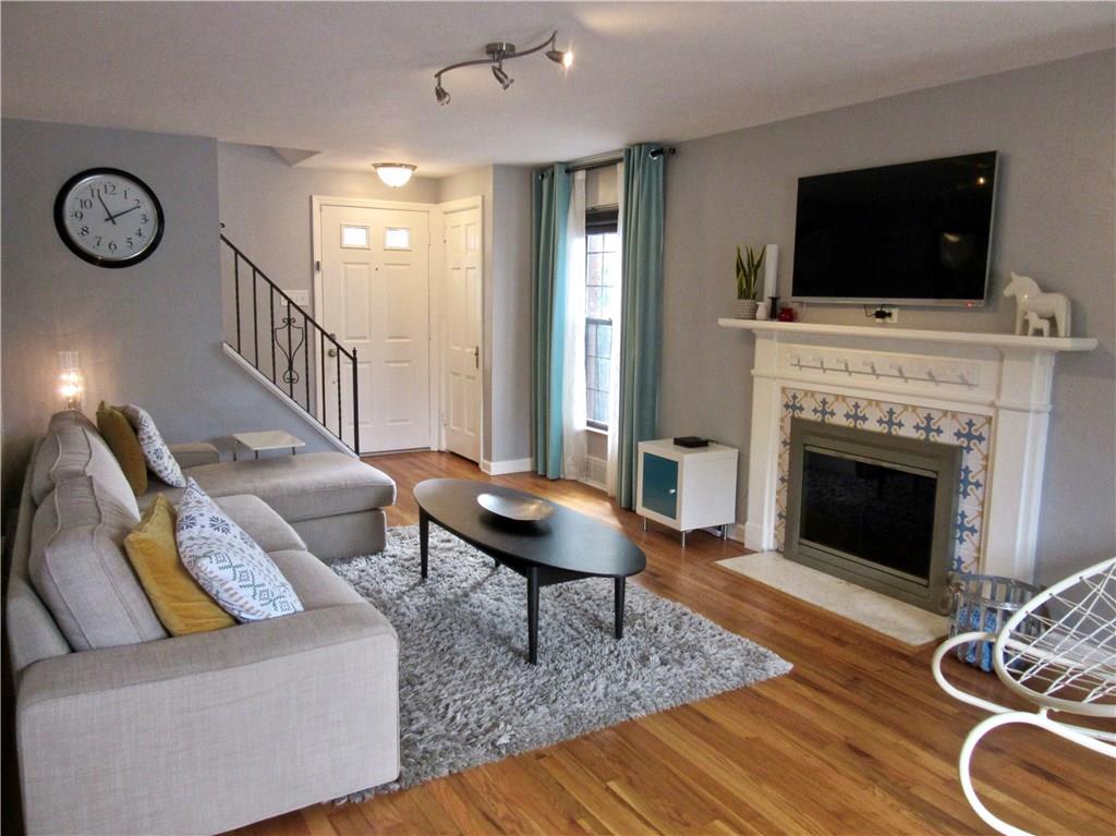 454 Haverhill Road Pittsburgh, PA 15228 - Photo 3 of 25 Another view of living room and its pretty fireplace.