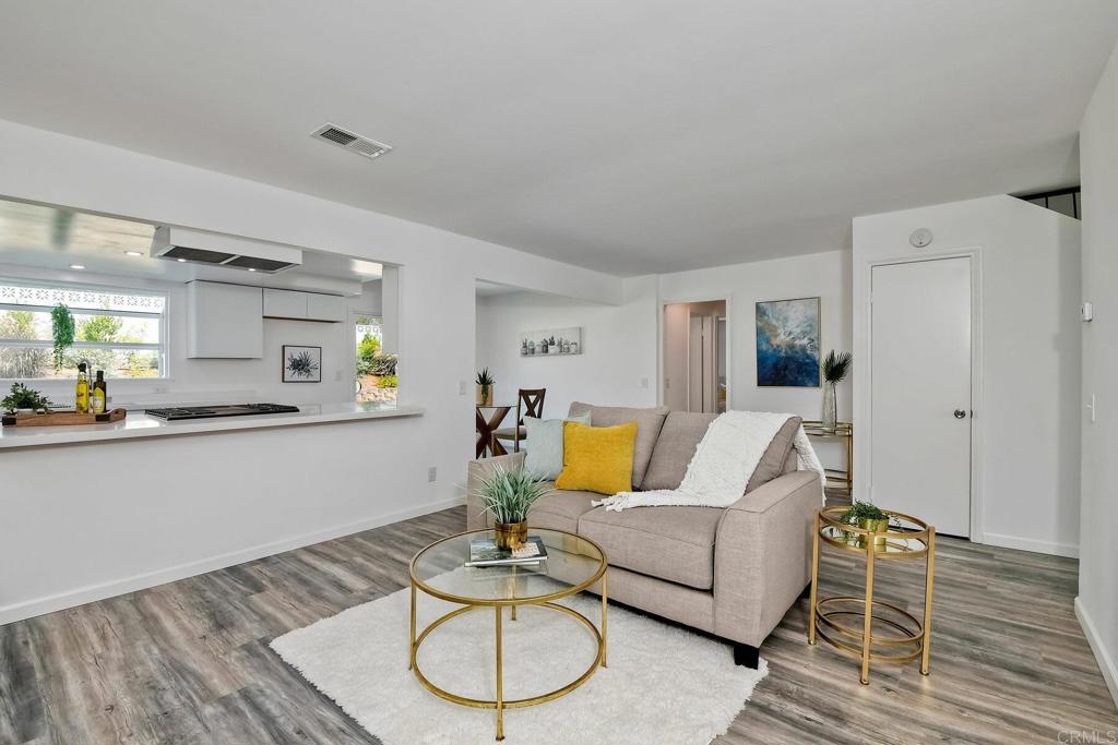 3106 Morningside Drive Oceanside, CA 92056 - Photo 13 of 38 a living room with furniture and wooden floor