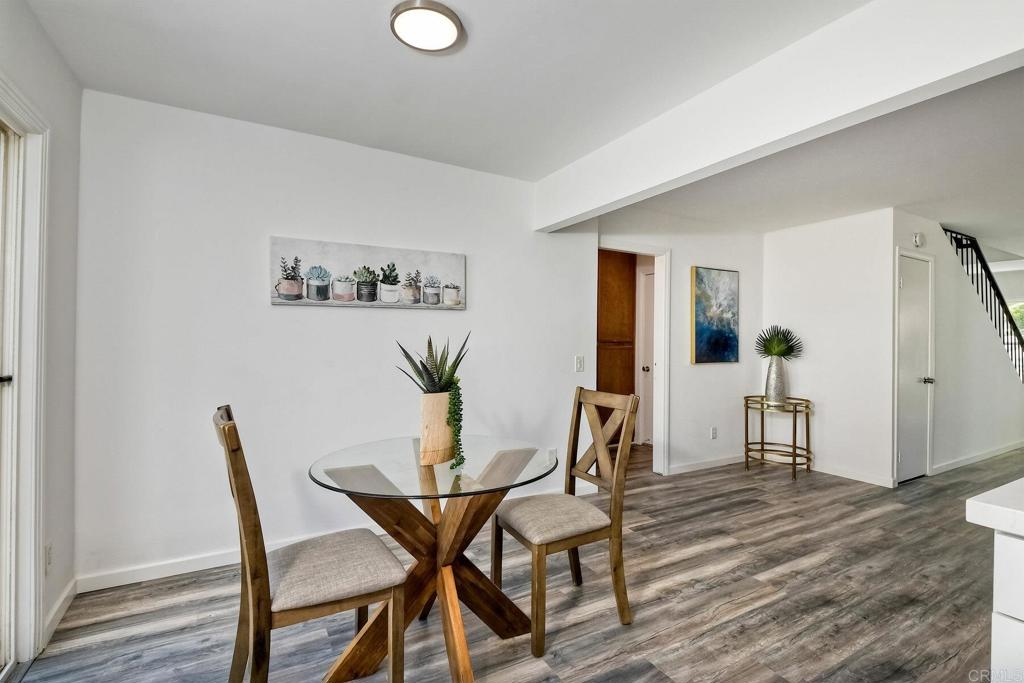 3106 Morningside Drive Oceanside, CA 92056 - Photo 16 of 38 a view of a dining room with furniture and wooden floor