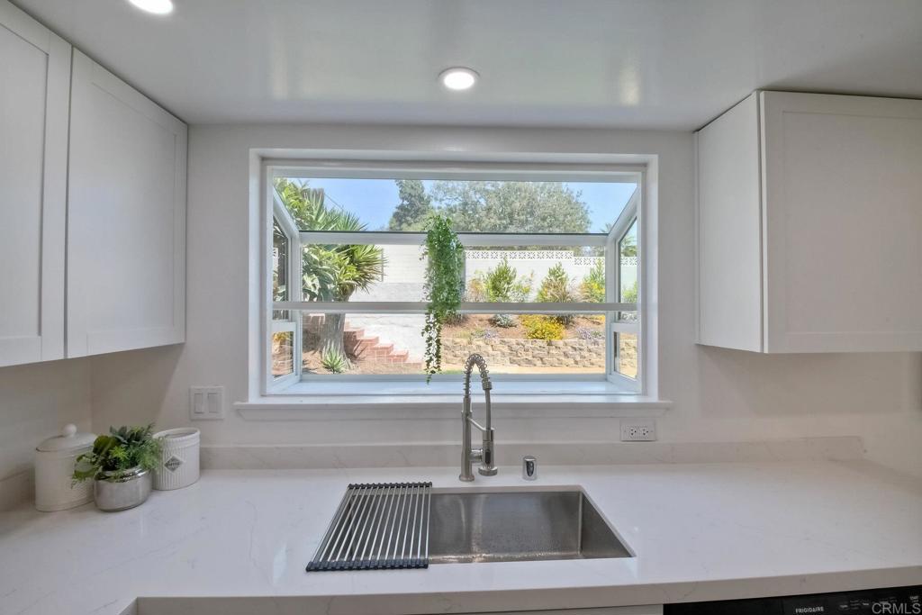 3106 Morningside Drive Oceanside, CA 92056 - Photo 22 of 38 a kitchen with a sink and a window