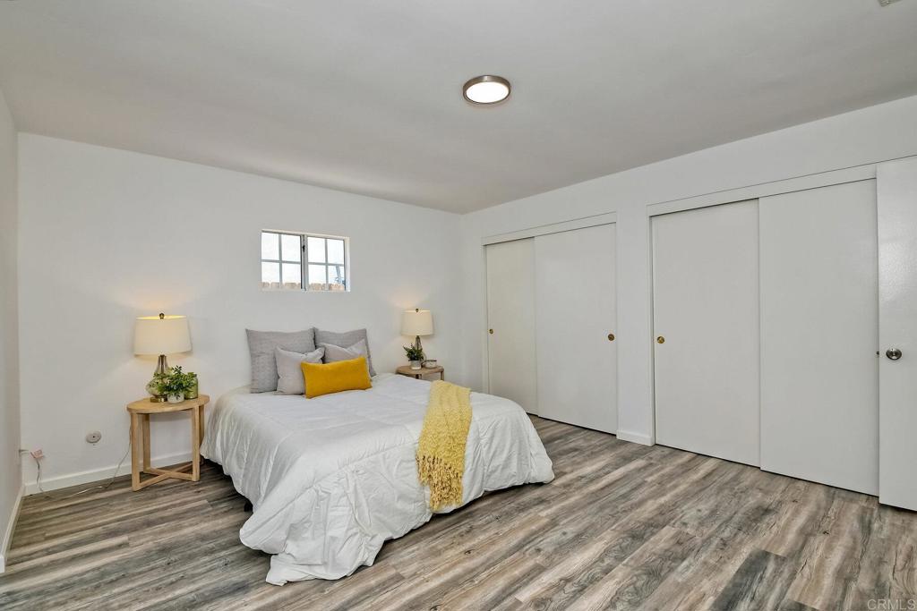 3106 Morningside Drive Oceanside, CA 92056 - Photo 24 of 38 a bedroom with a bed and window