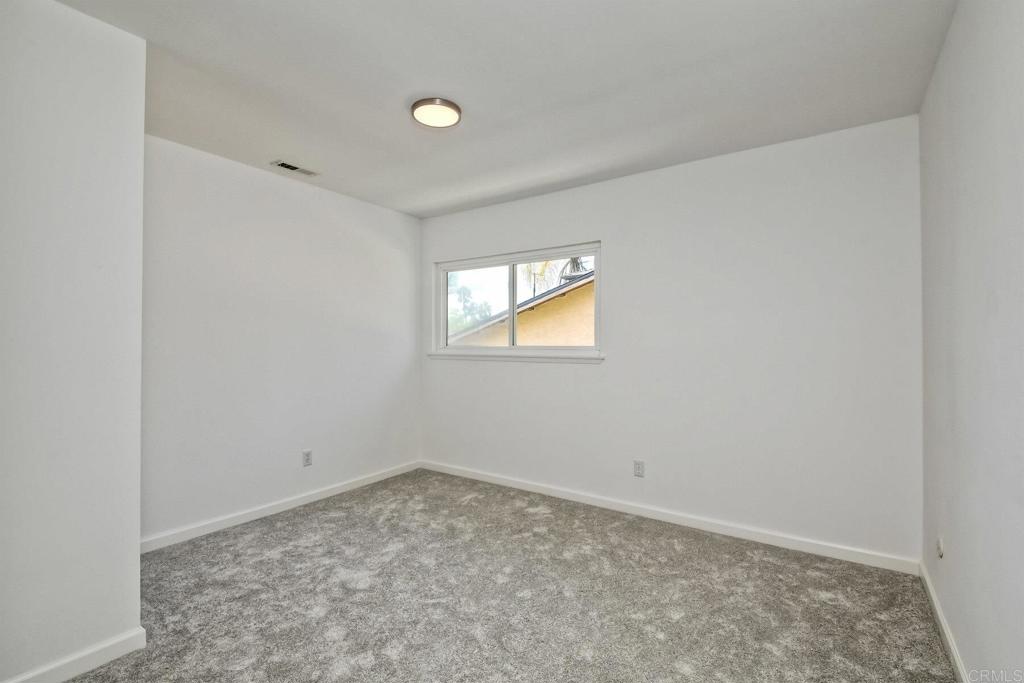 3106 Morningside Drive Oceanside, CA 92056 - Photo 32 of 38 an empty room with a window
