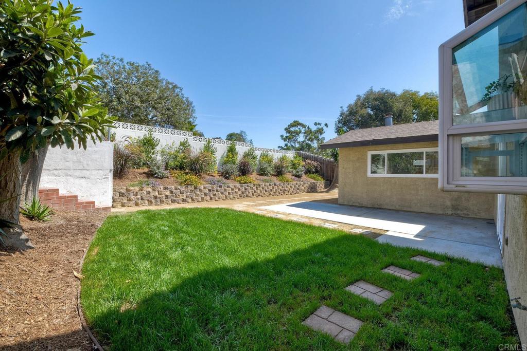 3106 Morningside Drive Oceanside, CA 92056 - Photo 35 of 38 a view of backyard of house with green space