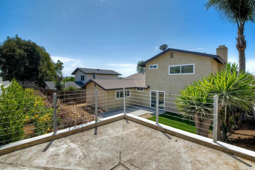 3106 Morningside Drive Oceanside, CA 92056 - Photo 37 of 38 a view of a house with a yard and potted plants