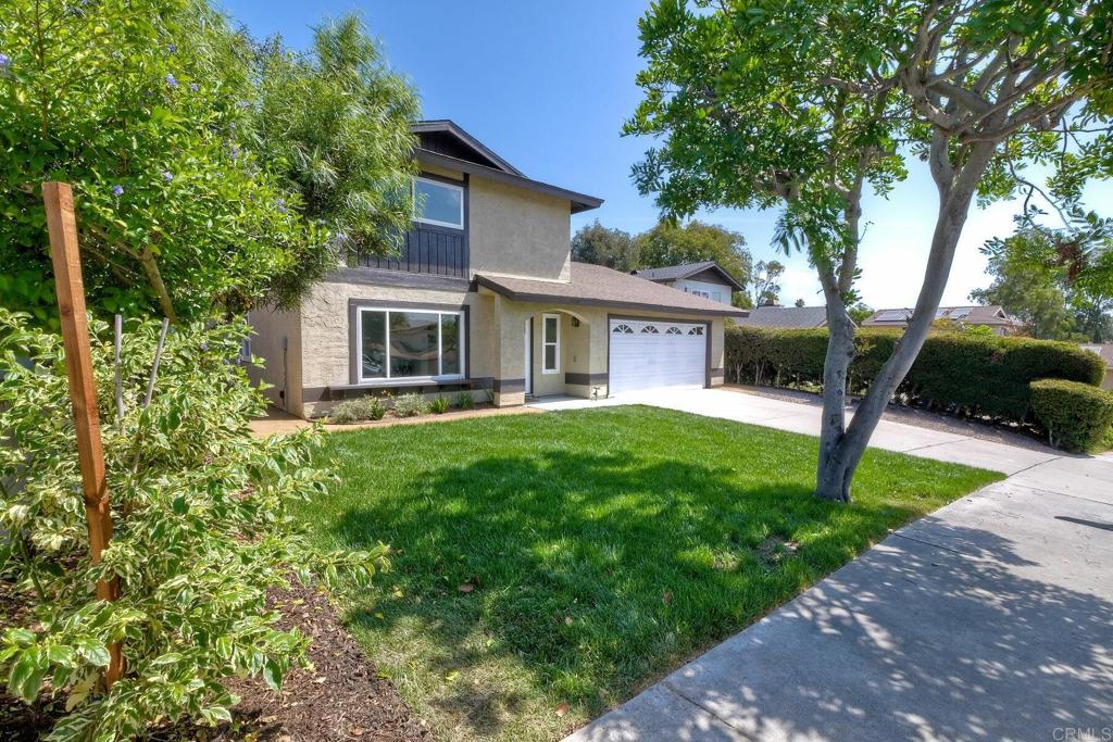 3106 Morningside Drive Oceanside, CA 92056 - Photo 4 of 38 a front view of a house with a yard and green space