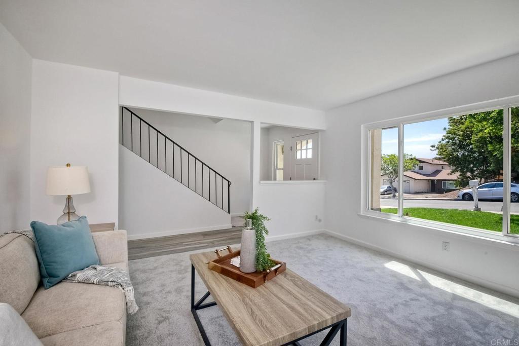 3106 Morningside Drive Oceanside, CA 92056 - Photo 9 of 38 a living room with furniture and a window