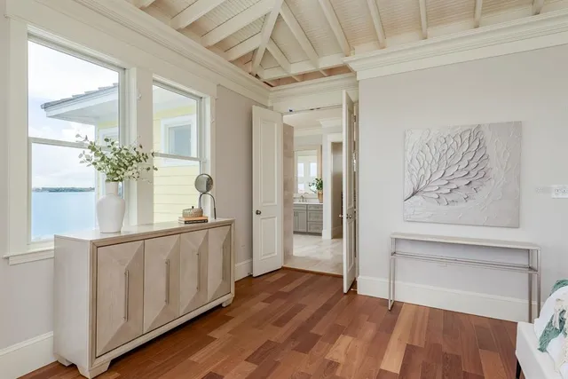a view of a porch of a house with wooden floor