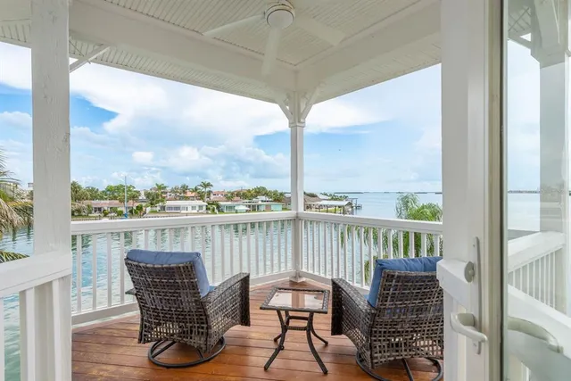 a view of entryway with wooden floor and stairs