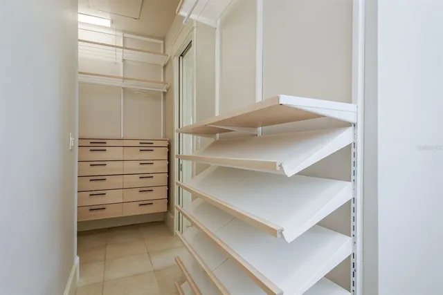 a front view of a residential apartment building with a yard