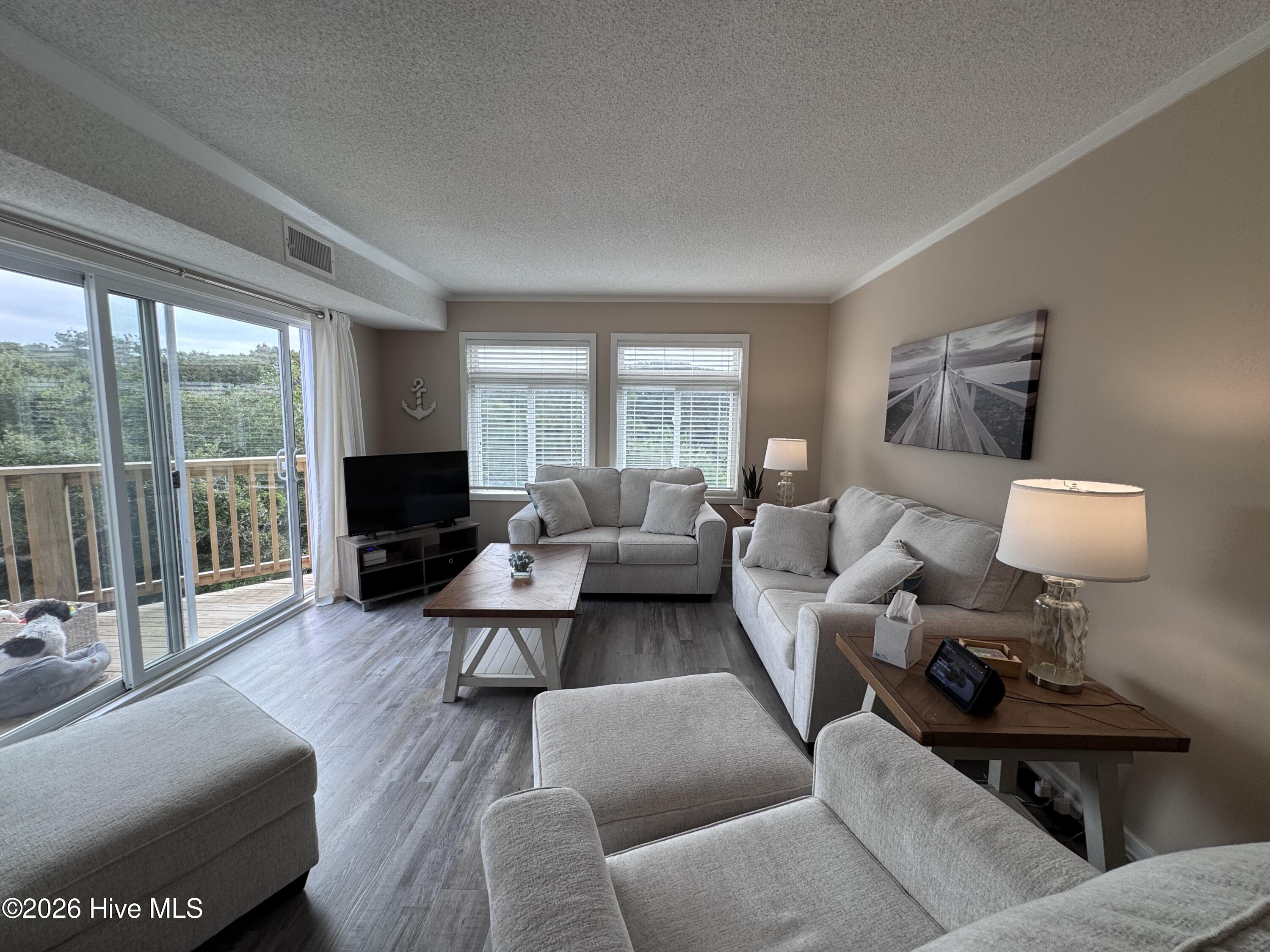 650 Salter Path Road, Unit 317 Pine Knoll Shores, NC 28512 - Photo 3 of 18 Living Room (2)